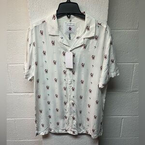 Denim and Flower Christmas Shirt.
Santa lifeguard, surfboard